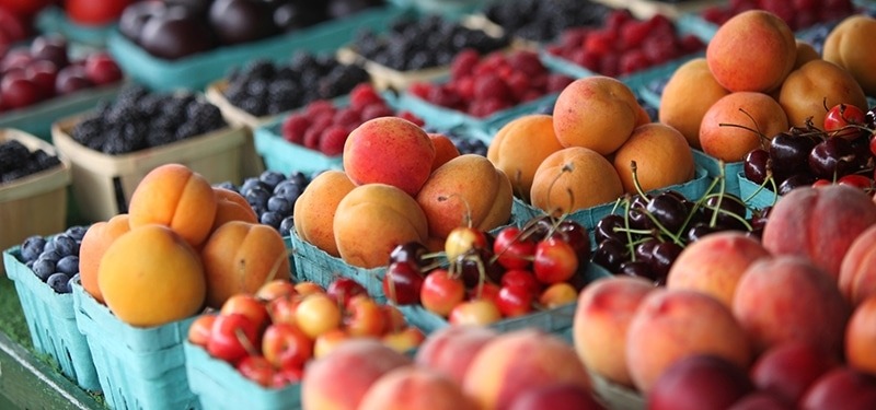 A cart of fruit at a market